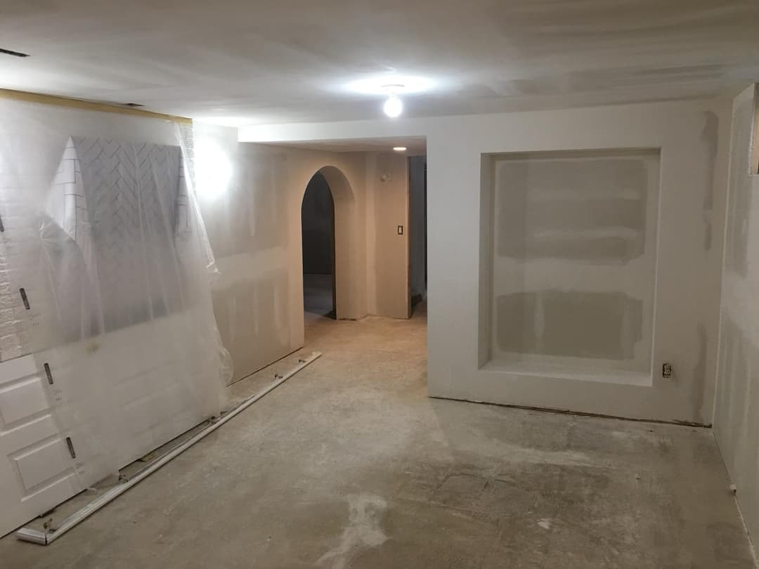 Drywall water-damage repair in Twin Cities home — replacing and refinishing damaged sheetrock walls.